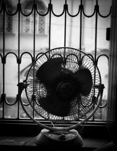 Electric fan on a hot day in the city.