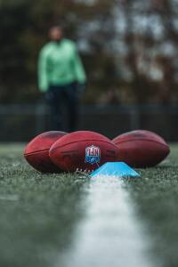 NFL Footballs on field for Week 3 NFL Preview article